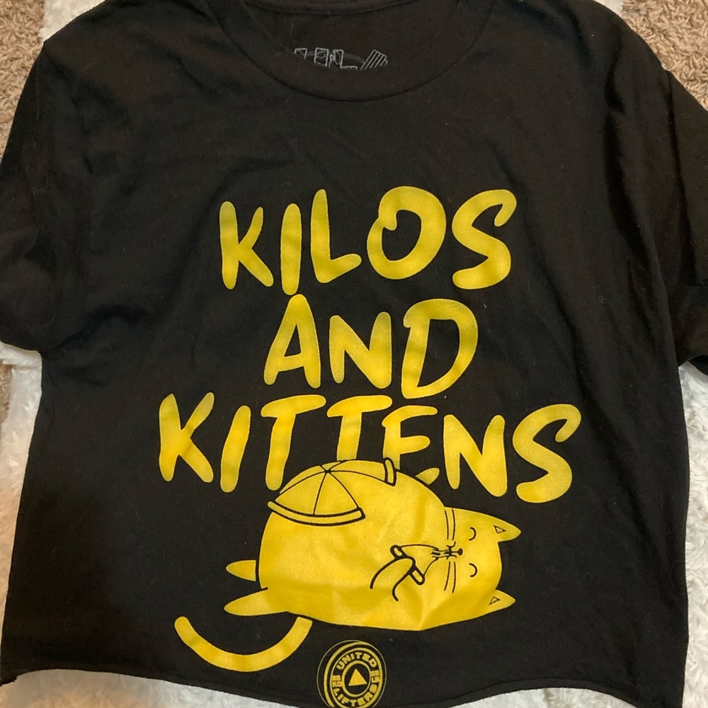 Kilos and kittens crop by United lifters